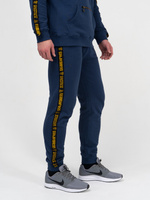 Спортивные штаны «Чемпион» цвета синего денима, плотный футер, с манжетами, с лампасами